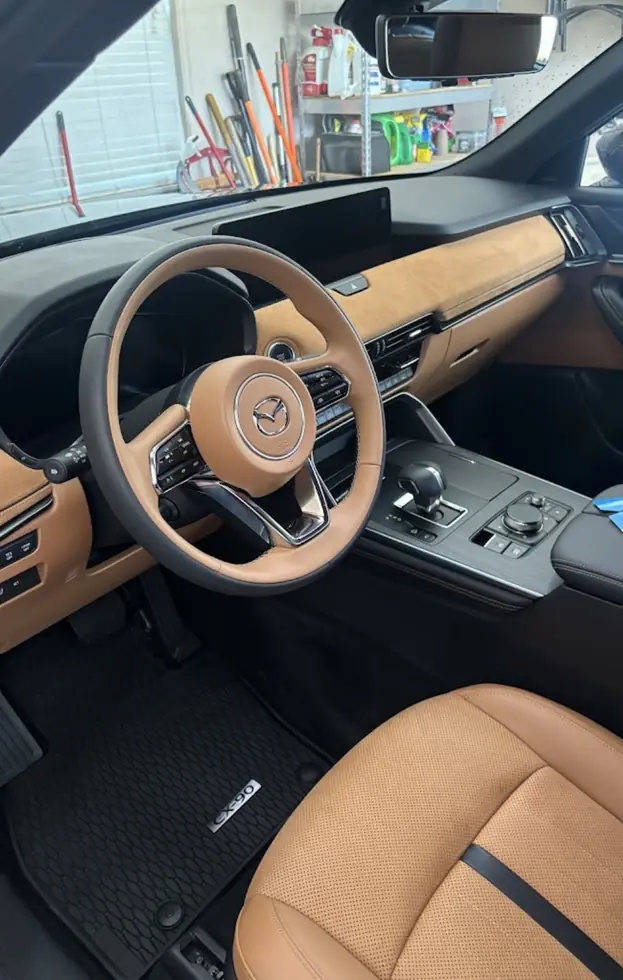 Tan and black Mazda interior detail after cleanup